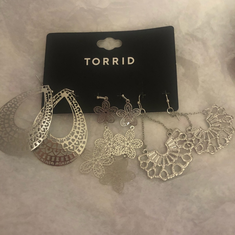 Three pairs new Torrid silver hanging earrings